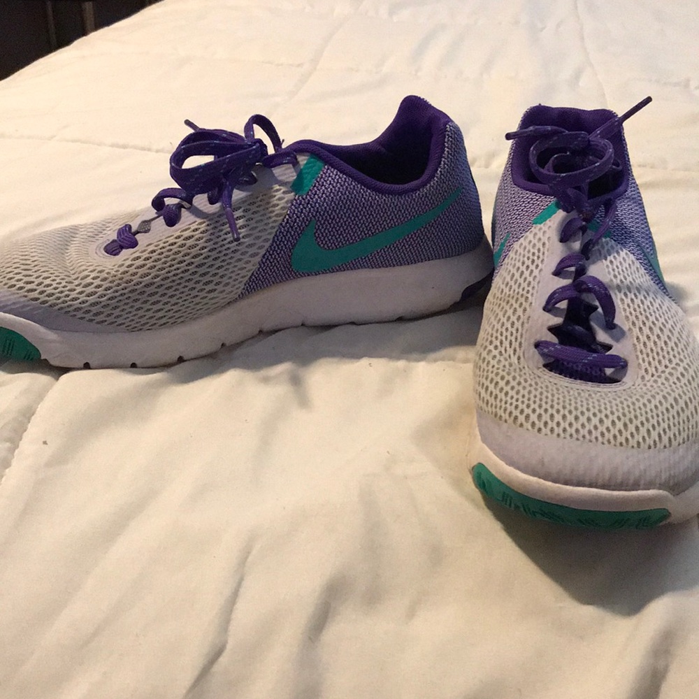 White and purple Nike running shoes